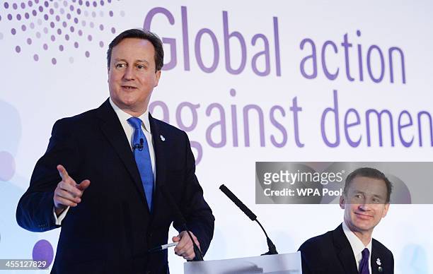 Prime Minister David Cameron and Health Secretary Jeremy Hunt attend the G8 Dementia Summit at Lancaster House on December 11, 2013 in London,...