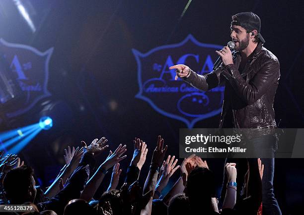 Recording artist Thomas Rhett performs during the American Country Awards 2013 at the Mandalay Bay Events Center on December 10, 2013 in Las Vegas,...