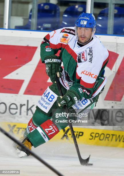 Ivan Ciernik of Augsburger Panther handles the puck during the action shot on august 15, 2014 in Straubing, Germany.