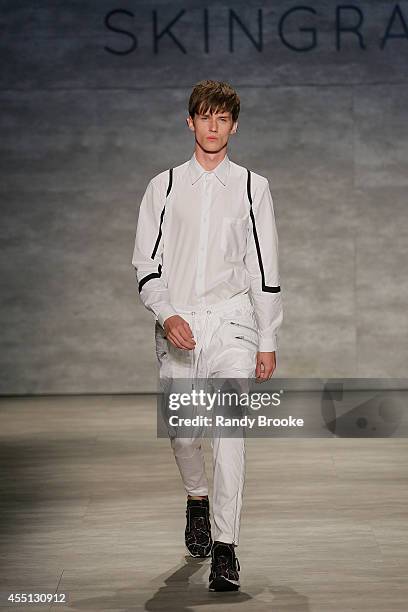 Model walks the runway at Skingraft during Mercedes-Benz Fashion Week Spring 2015 at The Pavilion at Lincoln Center on September 9, 2014 in New York...