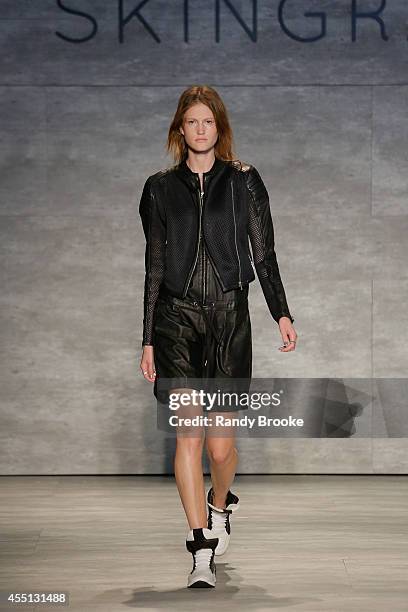 Model walks the runway at Skingraft during Mercedes-Benz Fashion Week Spring 2015 at The Pavilion at Lincoln Center on September 9, 2014 in New York...