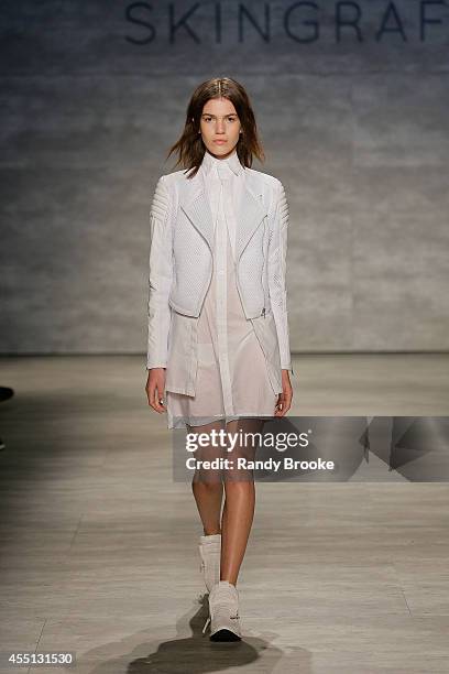 Model walks the runway at Skingraft during Mercedes-Benz Fashion Week Spring 2015 at The Pavilion at Lincoln Center on September 9, 2014 in New York...