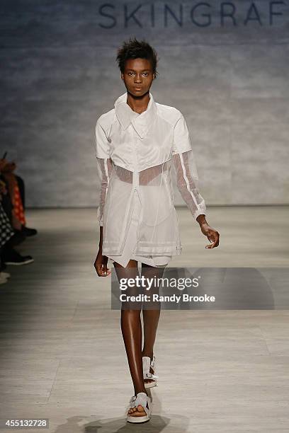 Model walks the runway at Skingraft during Mercedes-Benz Fashion Week Spring 2015 at The Pavilion at Lincoln Center on September 9, 2014 in New York...