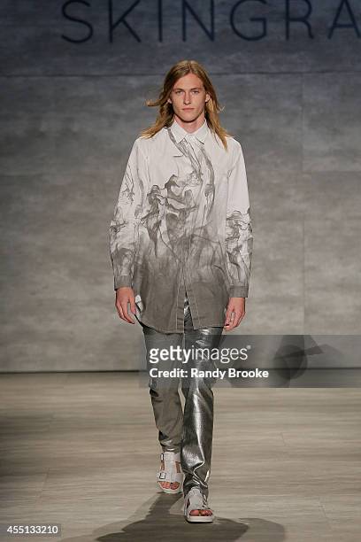 Model walks the runway at Skingraft during Mercedes-Benz Fashion Week Spring 2015 at The Pavilion at Lincoln Center on September 9, 2014 in New York...