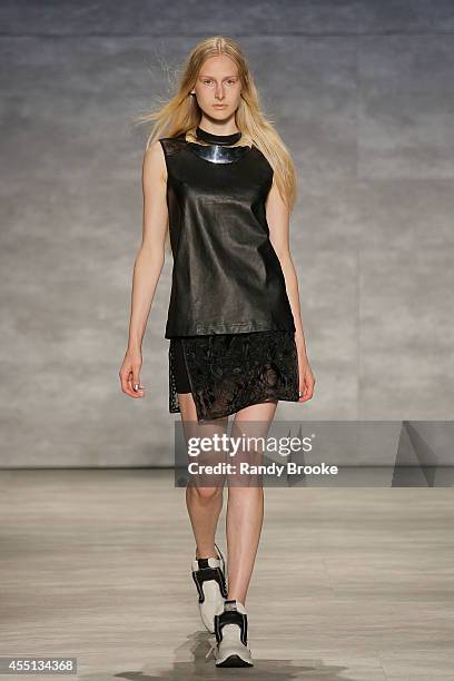 Model walks the runway at Skingraft during Mercedes-Benz Fashion Week Spring 2015 at The Pavilion at Lincoln Center on September 9, 2014 in New York...