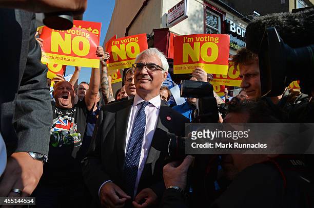 Alistair Darling MP campaigns for a ''No'' vote in the referendum on Rutherglen main street on September 10, 2014 in Glasgow, Scotland. The three UK...