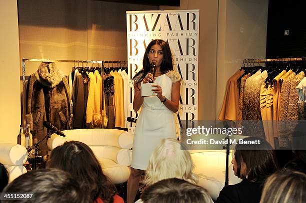 Megha Mittal speaks at the ESCADA/Harper's Bazaar book reading with Fatima Bhutto, reading from her novel "The Shadow Of The Crescent Moon", at the...