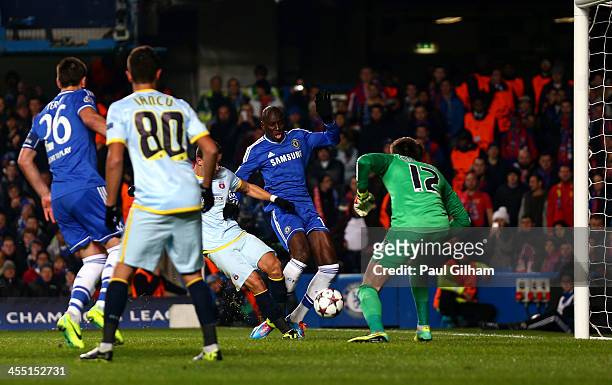 Demba Ba of Chelsea scores the opening goal during the UEFA Champions League Group E match between Chelsea and FC Steaua Bucuresti at Stamford Bridge...