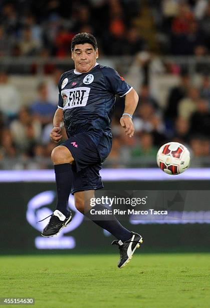 Diego Maradona in action during Interreligious Match for Peace at Olimpico Stadium on September 1, 2014 in Rome, Italy.