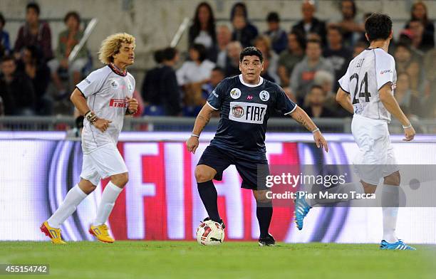 Diego Maradona in action during Interreligious Match for Peace at Olimpico Stadium on September 1, 2014 in Rome, Italy.