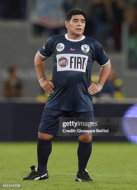 Diego Maradona in action during Interreligious Match for Peace at Olimpico Stadium on September 1, 2014 in Rome, Italy.