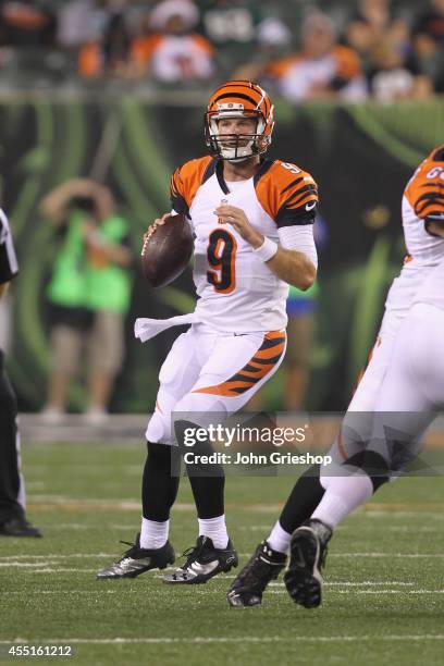 Tyler Wilson of the Cincinnati Bengals drops back to pass during the game against the New York Jets at Paul Brown Stadium on August 16, 2014 in...