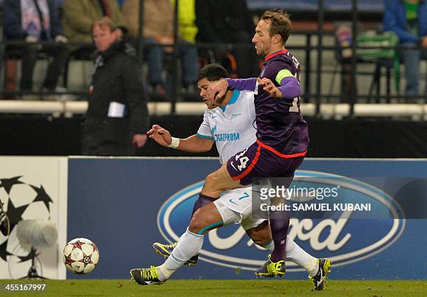 Zenit's Brazilian forward Hulk and Austria Wien's defender Manuel Ortlechner vie for the ball during the UEFA Champions League group G football match...