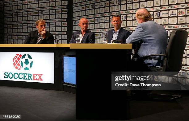 Left to right - Former Manchester United footballers Phil Neville, Nicky Butt and Ryan Giggs, take part in a discussion about Manchester United's...