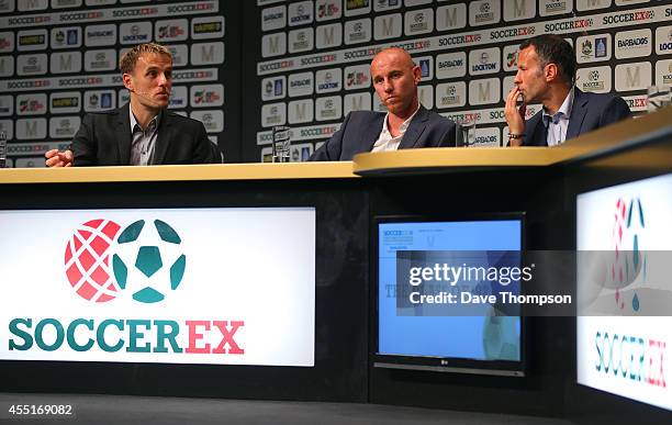 Left to right - Former Manchester United footballers Phil Neville, Nicky Butt and Ryan Giggs, take part in a discussion about Manchester United's...