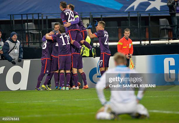Austria's players celebrate after scoring during the UEFA Champions League group G football match FK Austria Wien vs FC Zenit in Vienna, Austria, on...