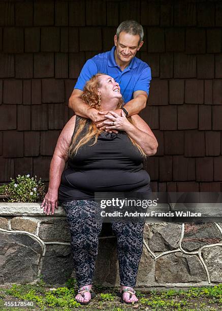 Jim Crosby and his wife Lorraine Charland poses at their Oshawa home, September 9, 2014. The couple talks about their emotional roller coaster when...