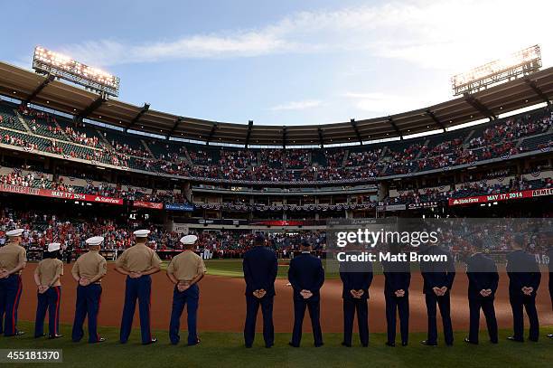 Military members during Armed Forces Day before the game between the Tampa Bay Rays and Los Angeles Angels of Anaheim on May 17, 2014 at Angel...