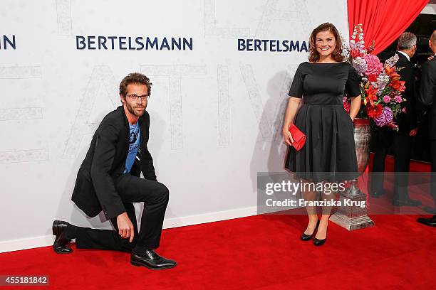 Jonas Grosch and Katharina Wackernagel attend the Bertelsmann Summer Party at the Bertelsmann representative office on September 10, 2014 in Berlin,...