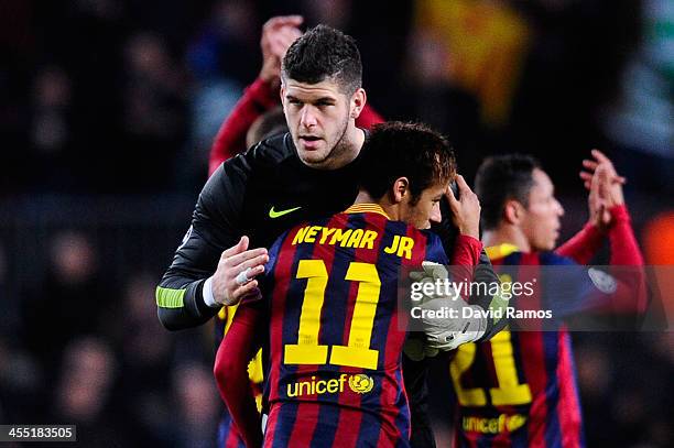 Fraser Forster of Celtic FC hugs Neymar of FC Barcelona at the end of the Champions League Group H match between FC Barcelona and Celtic FC at Camp...