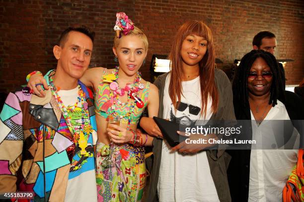 Designer Jeremy Scott, Miley Cyrus, Jerzey Dean and Whoopi Goldberg pose baskstage at Jeremy Scott fashion show during MADE Fashion Week Spring 2015...