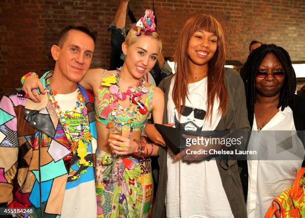 Designer Jeremy Scott, Miley Cyrus, Jerzey Dean and Whoopi Goldberg pose baskstage at Jeremy Scott fashion show during MADE Fashion Week Spring 2015...