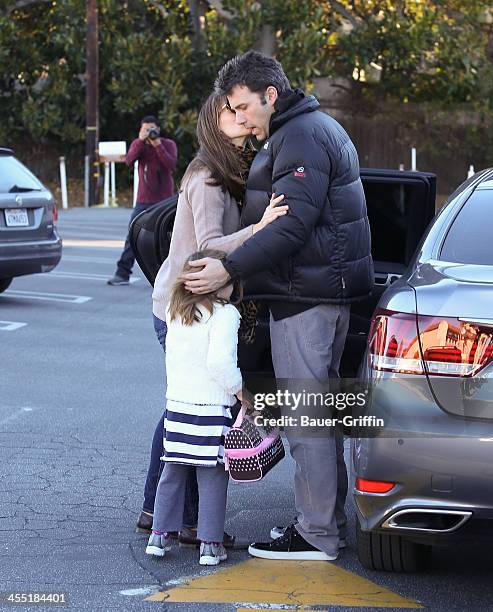 Ben Affleck and Jennifer Garner with Seraphina Affleck are seen on December 11, 2013 in Los Angeles, California.