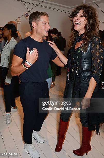 Luke Day, Fashion Director at British GQ Style, and Jess Morris attend the Whistles x GQ Style House Party on September 10, 2014 in London, England.