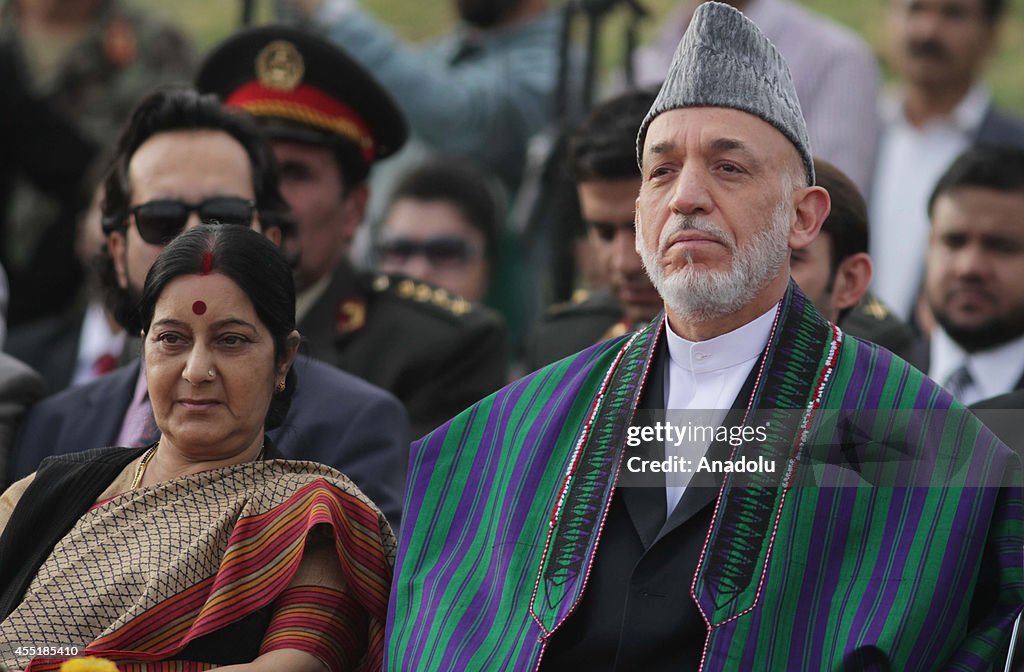 Afghan President Karzai attends the inauguration ceremony of Wazir Akbar Khan hill