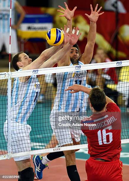 Argentina's Jose Luis Gonzalez and Sebastian Sole block, during the FIVB World Championships match between Argentina and France on Septembert 10,...