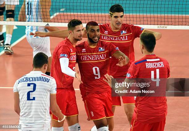 France's team after a point during the FIVB World Championships match between Argentina and France on Septembert 10, 2014 in Bydgoszcz, Poland.