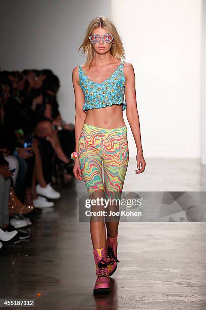 Model walks the runway at the Jeremy Scott fashion show during MADE Fashion Week Spring 2015 at Milk Studios on September 10, 2014 in New York City.