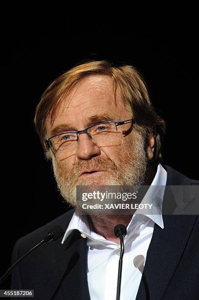 Quentin Raspail, creator and president of the festival, delivers a speech on September 10, 2014 during the opening night of the Festival of TV...