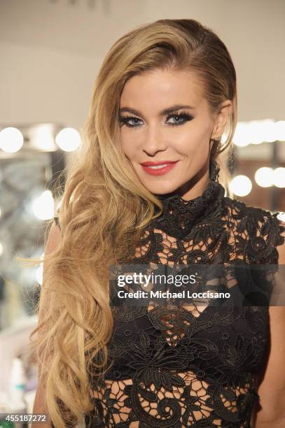 Actress Carmen Electra poses backstage during the Wantmylook by Lilly Ghalichi Style360 Spring 2015 fashion show at Metropolitan Pavilion on...