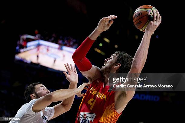 Pau Gasol of Spain shoots against Joffrey Lauvergne of France during the 2014 FIBA World Basketball Championship quarter final match between France...