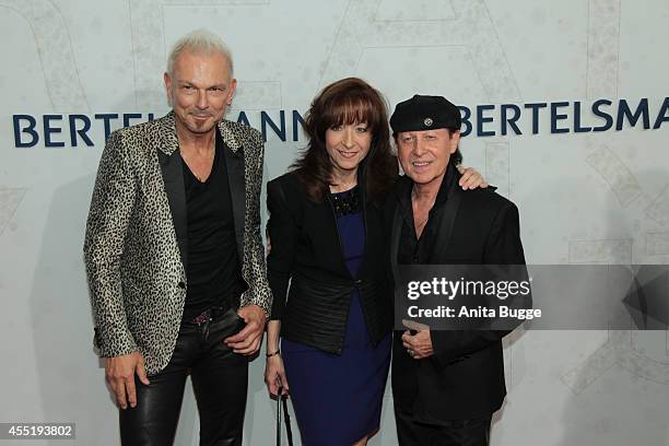 Rudolf Schenker, Gabi Meine and Klaus Meine attend the Bertelsmann Summer Party at the Bertelsmann representative office on September 10, 2014 in...