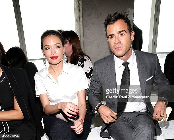 Shu Qi and Justin Theroux attend Boss Women during Mercedes-Benz Fashion Week Spring 2015 at 4 World Trade Center on September 10, 2014 in New York...