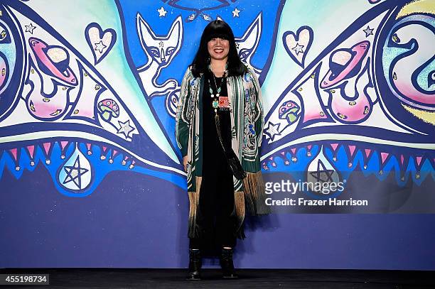 Designer Anna Sui appears on the runway at the Anna Sui fashion show during Mercedes-Benz Fashion Week Spring 2015 at The Theatre at Lincoln Center...