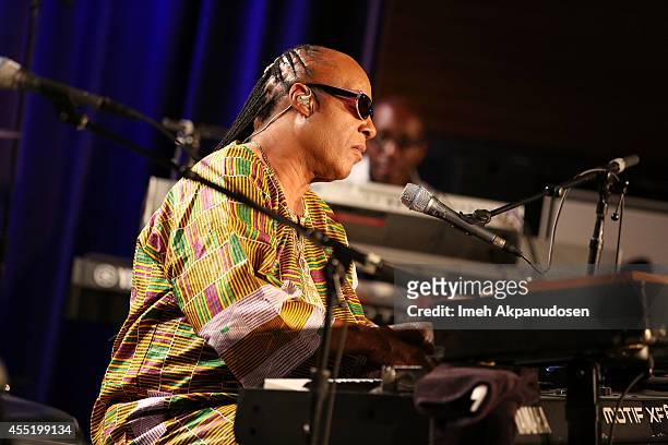 Singer/songwriter Stevie Wonder performs onstage after announcing the 'Songs in the Key of Life' tour at The GRAMMY Museum on September 10, 2014 in...