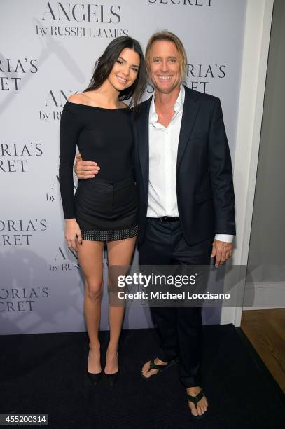 Kendall Jenner and photographer Russell James attend Russell James' "Angels" book launch hosted by Victoria's Secret on September 10, 2014 in New...