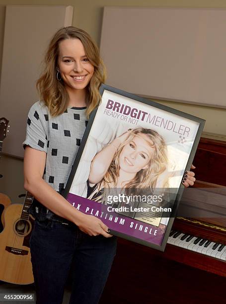Hollywood Records recording artist Bridgit Mendler receives an RIAA certified platinum award for her debut single "Hello My Name Is" at Disney...