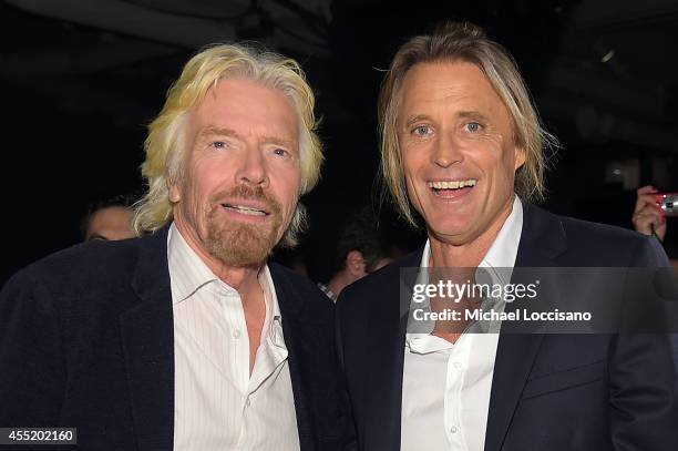 Sir Richard Branson and photographer Russell James attend Russell James' "Angels" book launch hosted by Victoria's Secret on September 10, 2014 in...