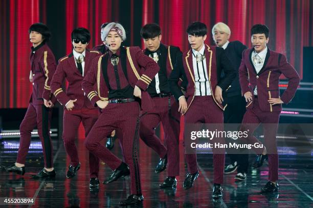 Super Junior perform on stage during the MBC Music "Show Champion" on September 10, 2014 in Ilsan, South Korea.