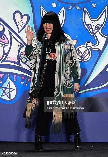 Designer Anna Sui appears on the runway at the Anna Sui fashion show during Mercedes-Benz Fashion Week Spring 2015 at The Theatre at Lincoln Center...