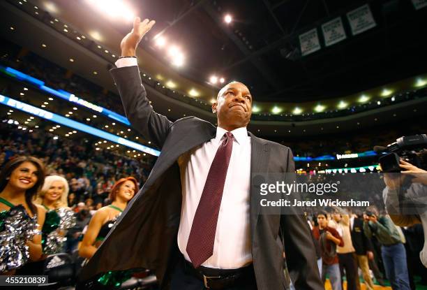 Los Angeles Clippers head coach, Doc Rivers, acknowledges the crowd prior to the game against his former team, the Boston Celtics, at TD Garden on...