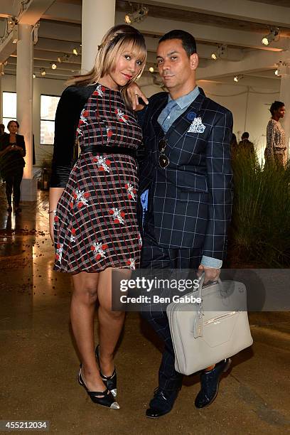 Fashion blogger Tia Walker and TV personality James Aguiar attend the Hanley Mellon Fashion Presentation during Mercedes-Benz Fashion Week Spring...