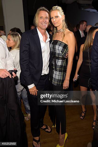 Photographer Russell James and model Karolina Kurkova attend Russell James' "Angels" book launch hosted by Victoria's Secret on September 10, 2014 in...