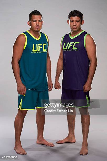 Lightweight champion and coach Anthony Pettis and coach Gilbert Melendez pose for a portrait during the TUF 20 Media Day session at the TUF gym on...