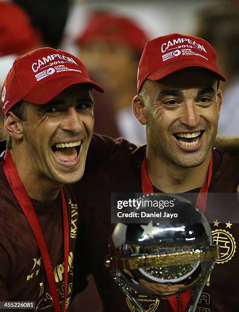 Leandro Somoza and Santiago Silva of Lanus, celebrate at the end of the final match between Lanus and Ponte Preta as part of the Copa TOTAL...