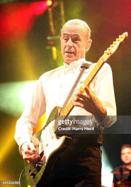 Francis Rossi of Status Quo performs on stage at BIC on December 11, 2013 in Bournemouth, United Kingdom.